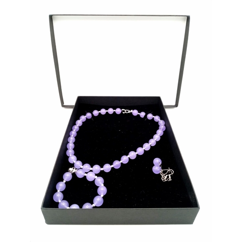 256 - A traditional, Chinese, top notch, Lavender Jade, necklace, bracelet and earrings set, in a presenta... 