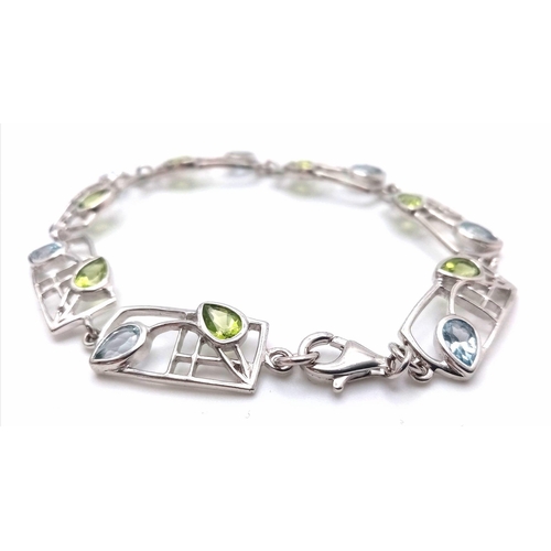 304 - A sterling silver bracelet in a stunning Charles Rennie Macintosh design, adorned with tear drop aqu... 