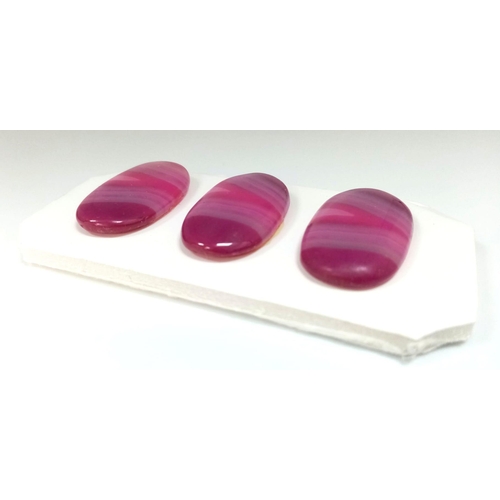 339 - A very special group of three banded red agate cabochons (28 x 17 mm) perfect for jewellery making.