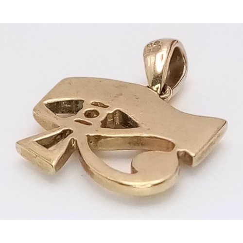 422 - A 9K Yellow Gold and Diamond Eye of Horus Pendant. 2cm. 1.35g total weight.