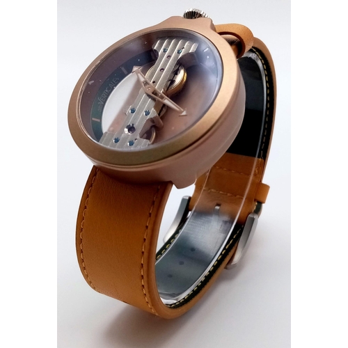 928 - A Verticale Mechanical Top Winder Gents Watch. Brown leather strap. Gold tone ceramic gilded skeleto... 