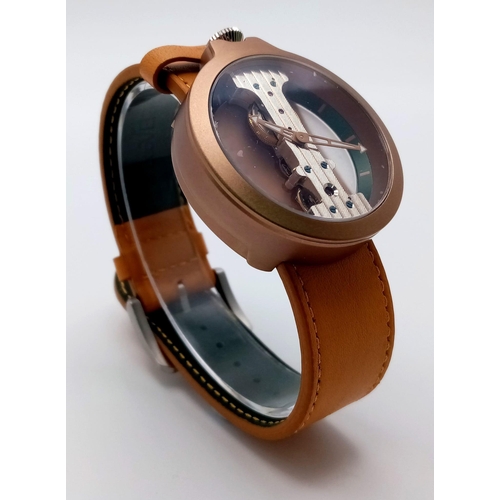 928 - A Verticale Mechanical Top Winder Gents Watch. Brown leather strap. Gold tone ceramic gilded skeleto... 