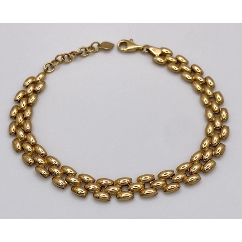 10 - A 9K Yellow Gold Three-Row Link Bracelet. 18cm. 4.5g weight