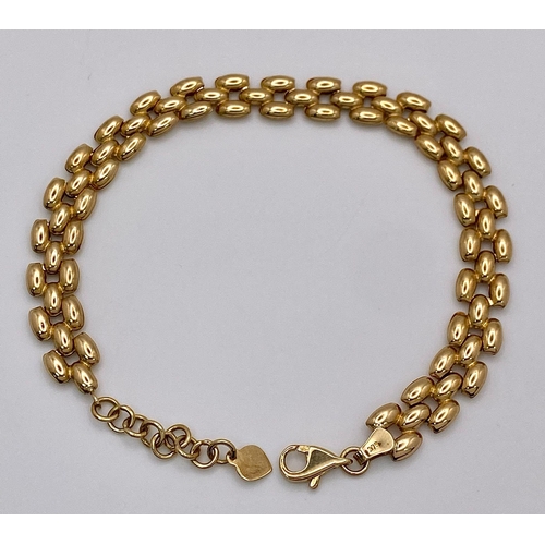 10 - A 9K Yellow Gold Three-Row Link Bracelet. 18cm. 4.5g weight