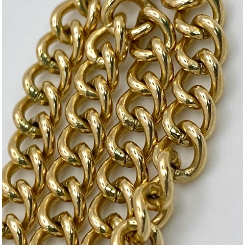 162 - A 9K Yellow Gold Small Curb Link Bracelet with Heart Clasp. 
17cm. 7.45g weight.