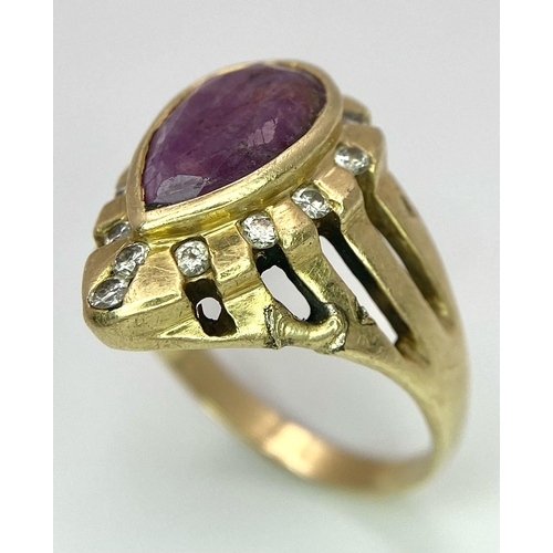 249 - A Vintage 14K Yellow Gold Amethyst and Diamond Ring. Teardrop central amethyst with a diamond surrou... 