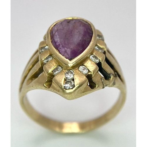 249 - A Vintage 14K Yellow Gold Amethyst and Diamond Ring. Teardrop central amethyst with a diamond surrou... 