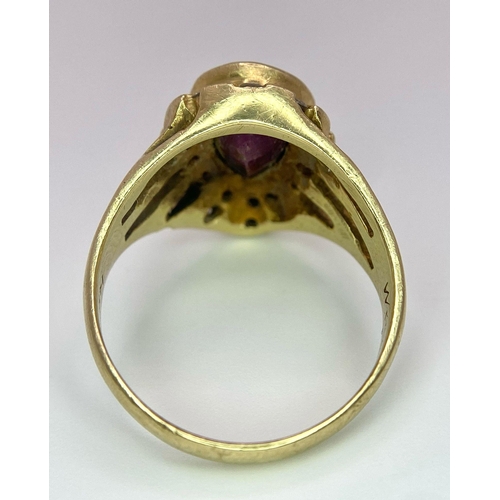 249 - A Vintage 14K Yellow Gold Amethyst and Diamond Ring. Teardrop central amethyst with a diamond surrou... 