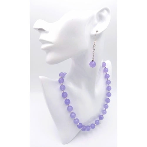 256 - A traditional, Chinese, top notch, Lavender Jade, necklace, bracelet and earrings set, in a presenta... 