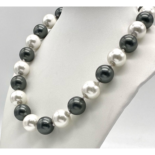 365 - A Large 16mm South Sea Pearl Shell Black and White Beaded Necklace. Very stylish - 44cm length.