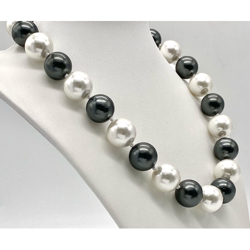 365 - A Large 16mm South Sea Pearl Shell Black and White Beaded Necklace. Very stylish - 44cm length.