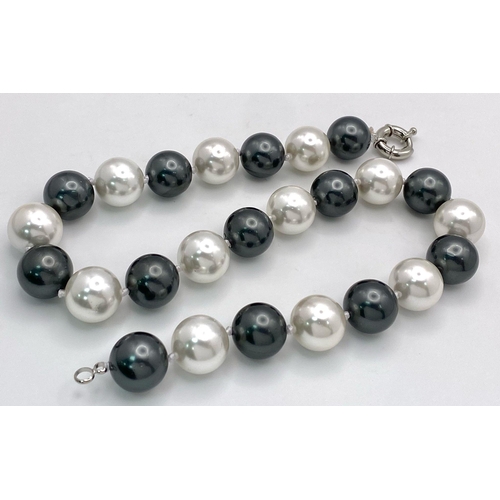 365 - A Large 16mm South Sea Pearl Shell Black and White Beaded Necklace. Very stylish - 44cm length.