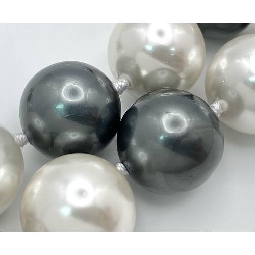 365 - A Large 16mm South Sea Pearl Shell Black and White Beaded Necklace. Very stylish - 44cm length.