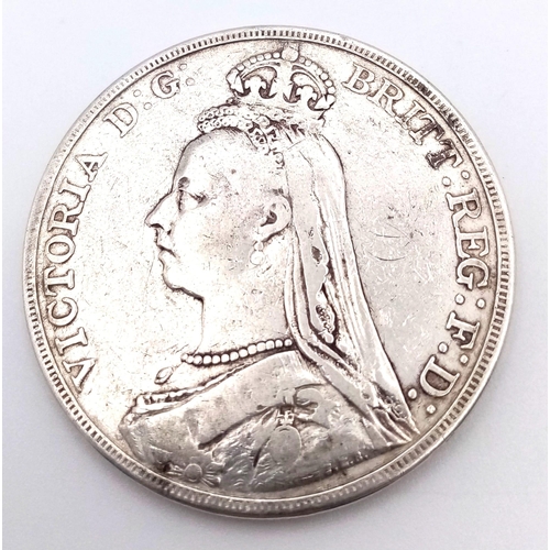 841 - An 1892 Queen Victoria Silver Crown Coin. VF grade but please see photos.