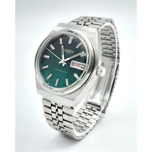 1456 - A Vintage Voken Automatic Gents Watch. Stainless steel bracelet and case - 37mm. Green dial with day... 