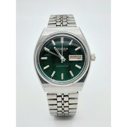 1456 - A Vintage Voken Automatic Gents Watch. Stainless steel bracelet and case - 37mm. Green dial with day... 