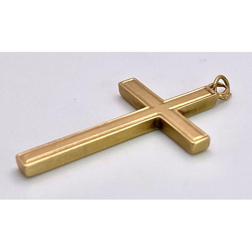 925 - A 9K Yellow Gold Cross Pendant. 2.5cm x 1.5cm. 1.88g weight.