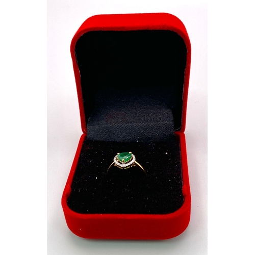 115 - A 14K Gold Heart Shaped Emerald Gemstone Ring - with 0.18ctw of Diamond Accents. Emerald - 0.75ct. S... 