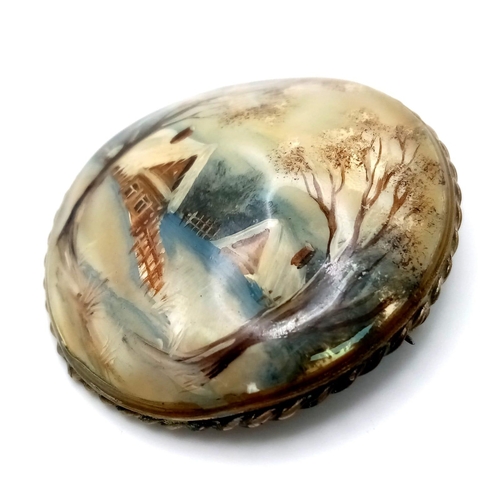 1571 - A Russian Mother of Pearl Hand-Made Brooch. 5cm diameter.