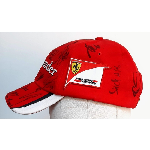 394 - An Official Ferrari Team Cap - Over 20 signatures including Ferrari drivers and team principals. Ple... 