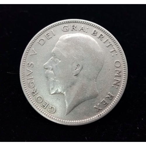 486 - A George V 1930 Silver Half Crown Coin. VF grade but please see photos.