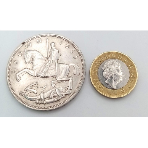 493 - A 1935 George V Silver Rocking Horse Crown Coin. EF grade but please see photos.