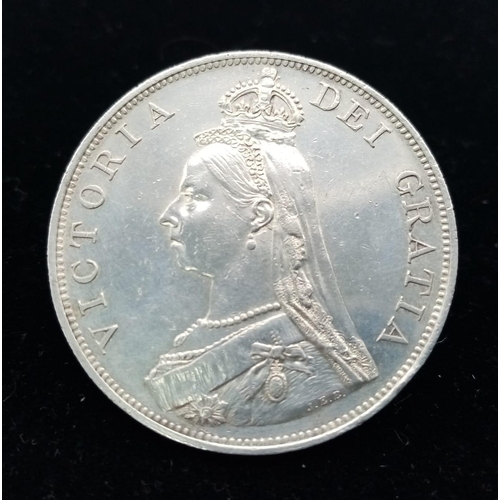 499 - An 1887 Queen Victoria Double Florin Silver Coin. EF grade but please see photos.