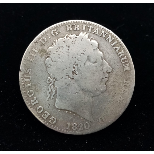 548 - An 1820 George III Silver Crown Coin. F+ grade but please see photos.