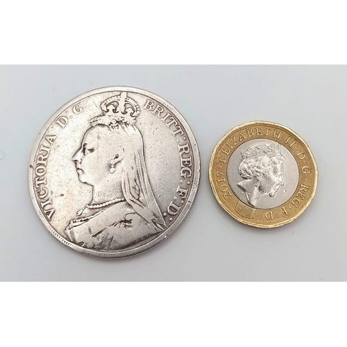 921 - An 1889 Queen Victoria Silver Crown Coin. VF grade but please see photos.