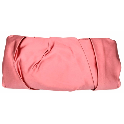 1296 - A Prada Pink Pleated Clutch Bag. Satin exterior with silver-toned hardware and press lock closure to... 