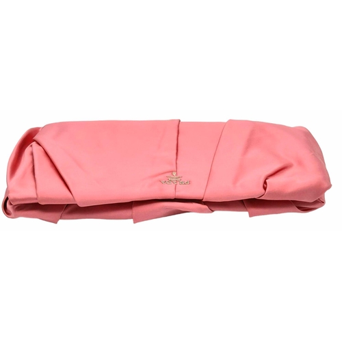 1296 - A Prada Pink Pleated Clutch Bag. Satin exterior with silver-toned hardware and press lock closure to... 