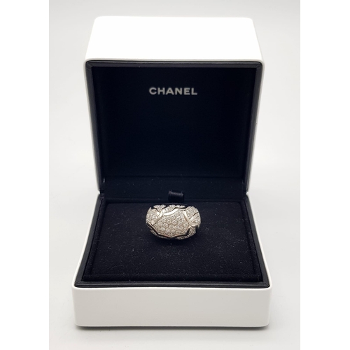 774 - A Chanel, Designer 18K White Gold Diamond Encrusted Ring. This head-turning piece has approximately ... 