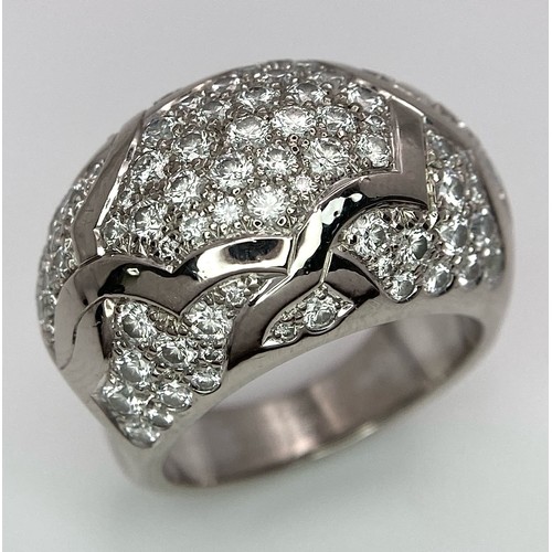 774 - A Chanel, Designer 18K White Gold Diamond Encrusted Ring. This head-turning piece has approximately ... 