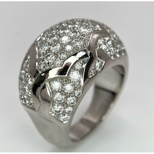 774 - A Chanel, Designer 18K White Gold Diamond Encrusted Ring. This head-turning piece has approximately ... 