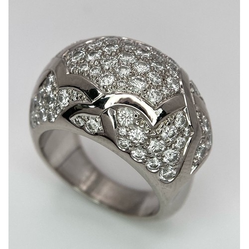 774 - A Chanel, Designer 18K White Gold Diamond Encrusted Ring. This head-turning piece has approximately ... 