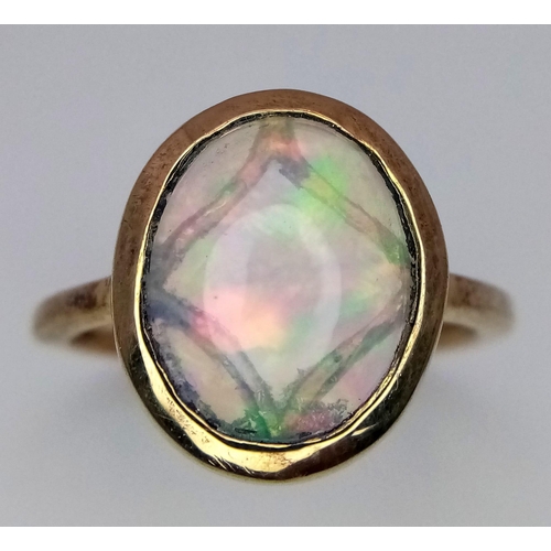 1569 - A Gold Plated 925 Silver Opal Ring. Size L. 2.62g weight.