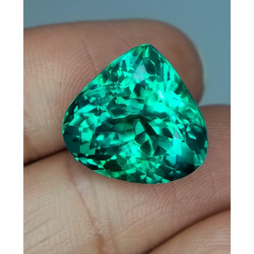 456 - A Beautiful 17ct Green/Blue Topaz Gemstone. Trillion shape with no visible marks or inclusions. No c... 