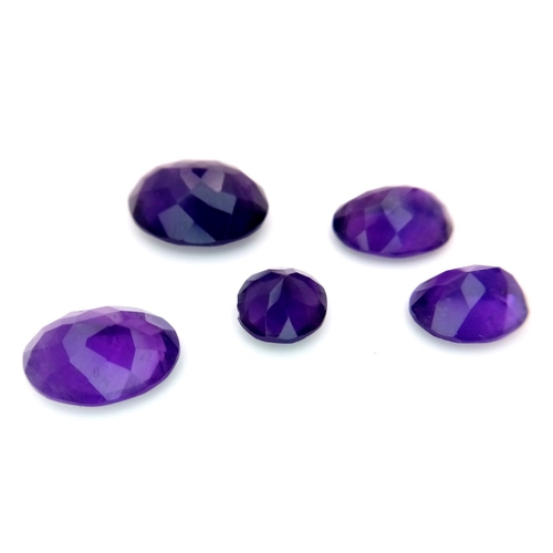 590 - A 20.35ctw Lot of Five Amethysts. Comes with a clip-open case.