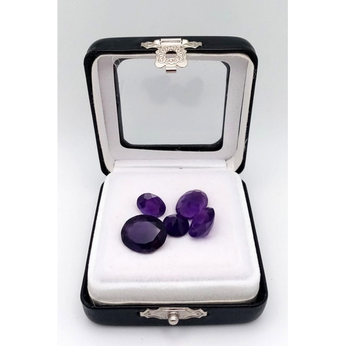 590 - A 20.35ctw Lot of Five Amethysts. Comes with a clip-open case.