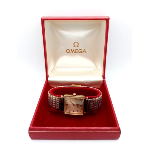 683 - A Vintage Omega 9K Gold Cased Gents De Ville Watch. 620 calibre. Gilded stainless steel bracelet. 9K... 