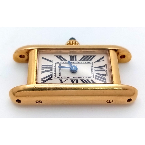 694 - A Vintage 18K Gold Cartier Mini Tank Ladies Watch Case. 18k gold case with 2443 and other Cartier ma... 