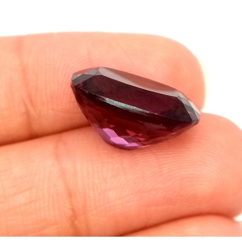 785 - A 16ct Purple Rhodolite Gemstone. Rectangular cut with no visible marks or inclusions. No certificat... 