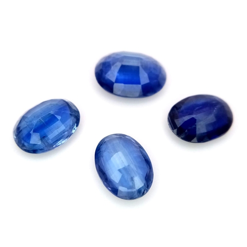 863 - A 6.1ctw of Kyanite Gemstones. Four stones in a clip-open case.