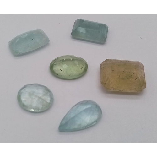 612 - A 42ctw Six Stone Lot of Aquamarines. Different shapes and shades. In a clip open case.