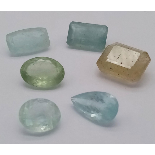 612 - A 42ctw Six Stone Lot of Aquamarines. Different shapes and shades. In a clip open case.