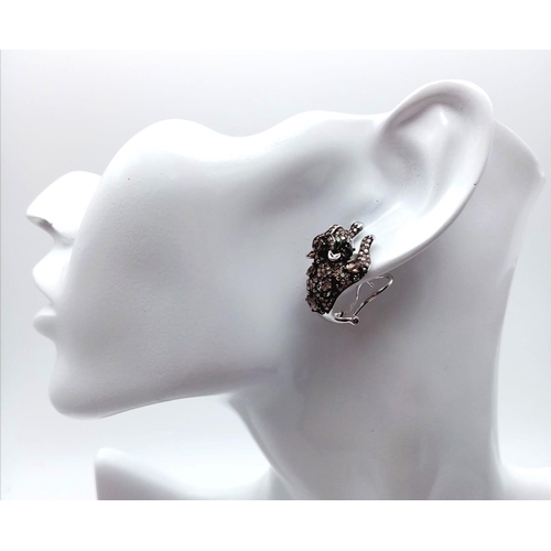 259 - A STUNNING PAIR OF 14K WHITE GOLD DIAMOND , CHAMPAGNE DIAMONDS AND EMERALD PANTHER EARRINGS.   10.5g... 