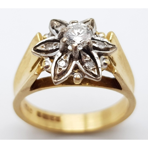 1458 - An 18K Yellow Gold Diamond Floral Cluster Ring. Size M. 6.65g total weight.