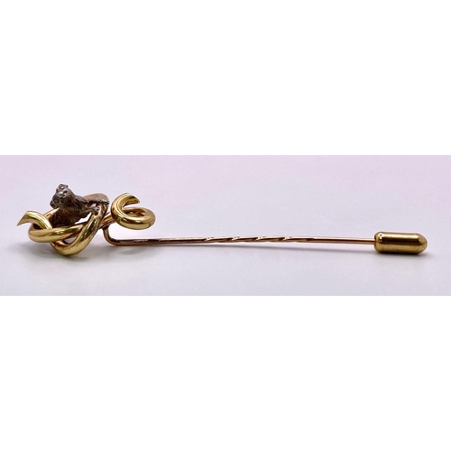 208 - An Antique Mid-Carat Gold Hat Pin with cute little creature accent.
Measuring 9cm in length and weig... 