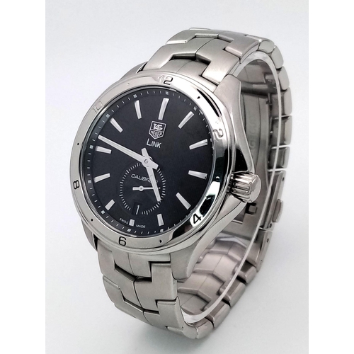 161 - A Tag Heuer Link Calibre 6 Automatic Watch. Stainless steel bracelet and case - 41mm. Black dial wit... 