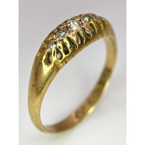 107 - An 18 K yellow gold ring with a band of five diamonds, size: O, weight: 3.2 g.